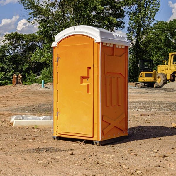 what is the cost difference between standard and deluxe porta potty rentals in Raven